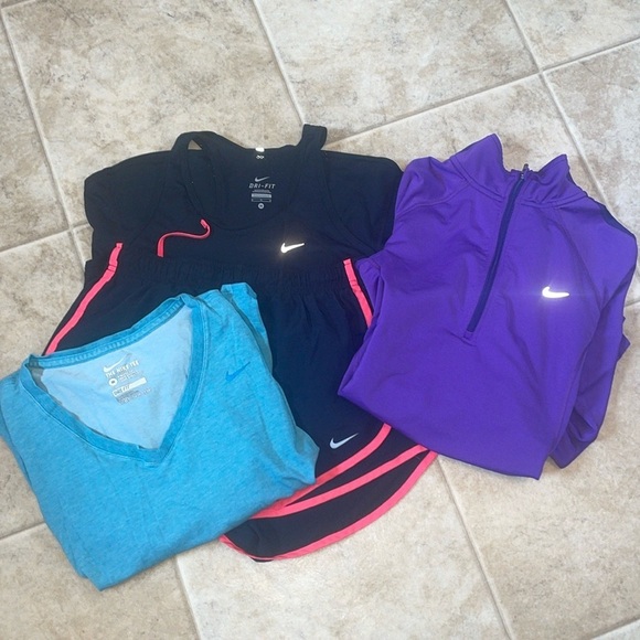 Nike Tops - Nike Lot of Workout/gym/running clothes.  Pullover, shorts, tank top, tee shirt‎